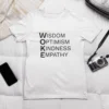 woke acronym t shirt | wisdom optimism kindness empathy | black text on short sleeve light tee