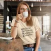 woke acronym t shirt | wisdom optimism kindness empathy | black text on short sleeve light tee