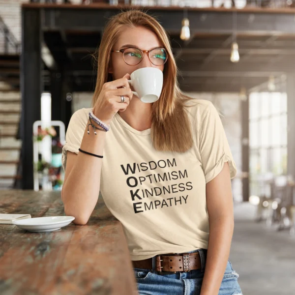 woke acronym t shirt | wisdom optimism kindness empathy | black text on short sleeve light tee